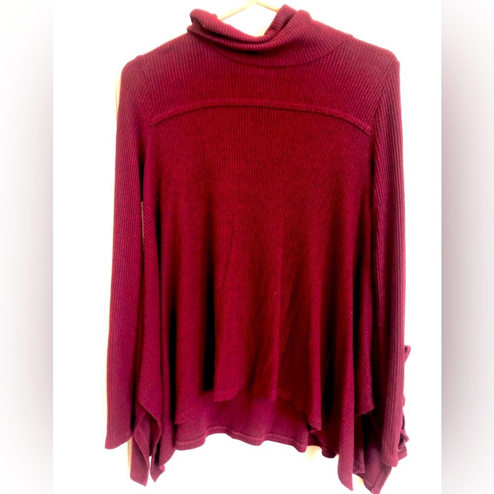 Asymmetrical burgundy turtleneck sweater